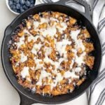 Cornbread Blueberry Buckle Coffee Cake in a cast iron skillet