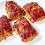 mini turkey meatloaves on a white plate.