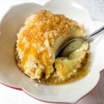 pineapple nice cream coconut ball in a white bowl