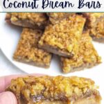 hand holding a coconut dream bar with a bite taken out.