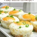 sausage egg biscuits on a white plate.