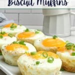 sausage egg biscuits on a white plate.