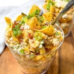 elote recipe with canned corn in a clear plastic cup.