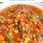 hamburger soup in a white bowl.