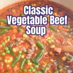 ground beef vegetable soup in a Dutch oven.