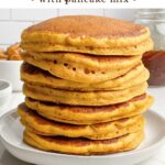 a stack of pumpkin pancakes on a white plate.