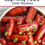grape jelly little smokies in a white bowl.