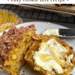 pumpkin snickerdoodle muffin on a white plate.