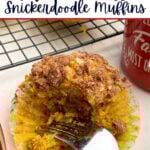 pumpkin snickerdoodle muffin in a paper liner.