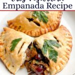 baked vegetarian empanadas on a white plate.