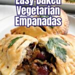 baked vegetarian empanadas on a white plate.