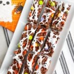 Halloween rice krispie treats on a white platter