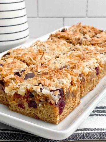 pumpkin yellow cake mix magic bars on white platter