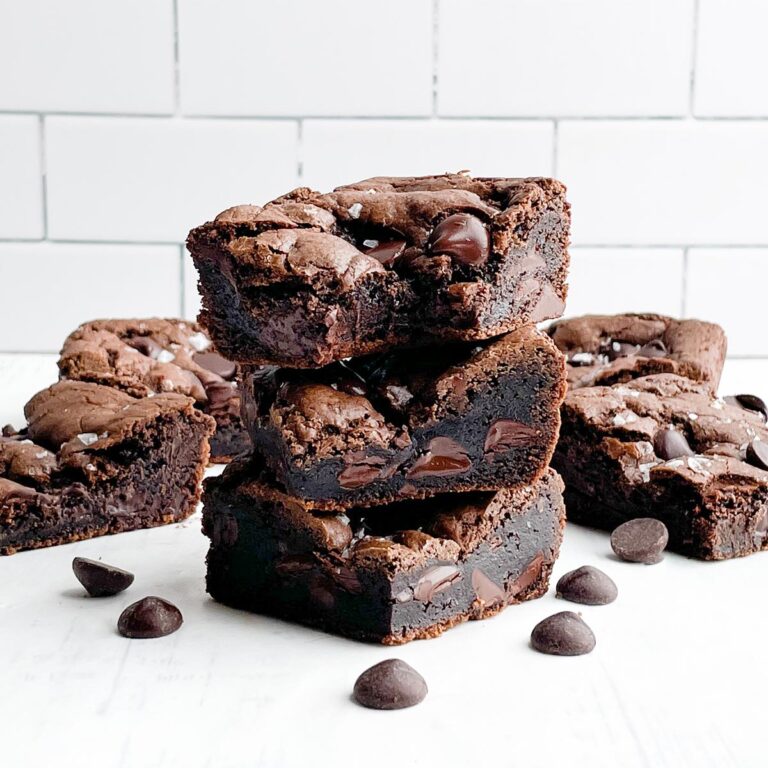 stack of three cake mix brownies on white countertop