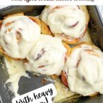 air fryer cinnamon rolls in a pan.