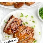 sliced oven baked teriyaki chicken thigh on a bed of white rice.