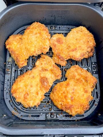cooked panko coated boneless chicken thighs in air fryer