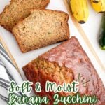 loaf of partially sliced banana zucchini bread on a cutting board.
