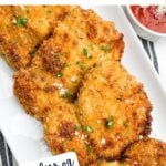 air fryer panko crusted chicken on a white plate.