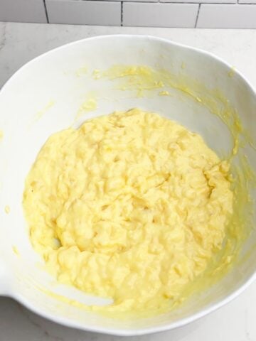 crushed pineapple and pudding mix in a white bowl