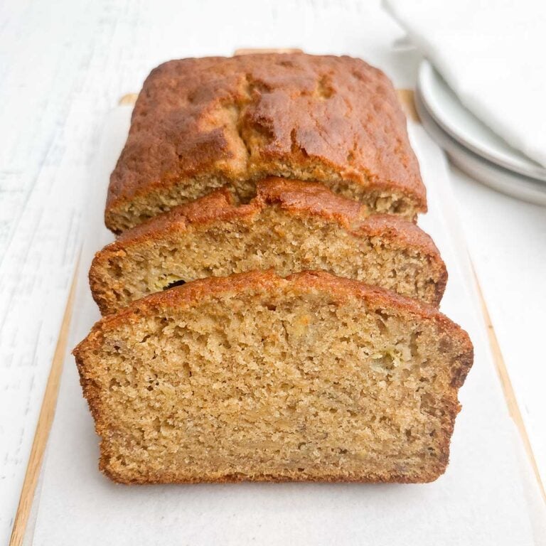 eye level view of slices of banana bread leaning back on the loaf
