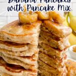 a stack of banana pancakes with caramelized banana topping on a white plate.