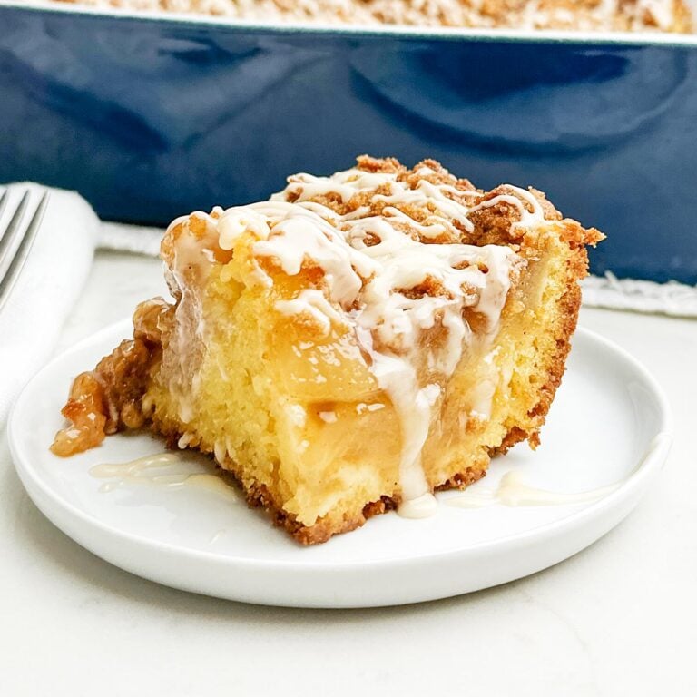 piece of apple pie coffee cake on a white plate