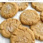 brown butter peanut butter cookies on parchment paper.