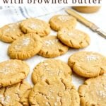 browned butter peanut butter cookies on parchment paper.