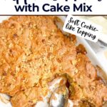 cake mix apple cobbler in a white baking dish.