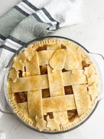 Apple pie topped with turbinado sugar.