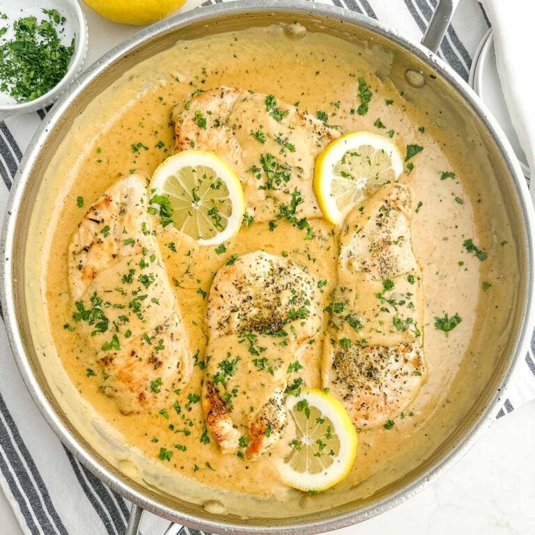 lemon herb chicken breast recipe with cream of chicken soup in a stainless steel skillet.