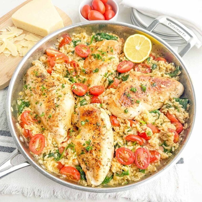 chicken spinach rice casserole in stainless steel skillet