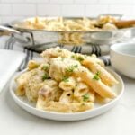 creamy chicken and pasta with cream of chicken soup on white plate.