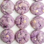 overhead view of lemon blueberry cookies on white parchment paper.