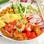 sweet potato and rice teriyaki bowl on a white countertop.