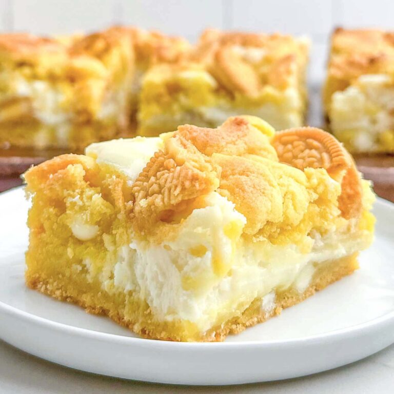 a lemon brownie on a white plate.