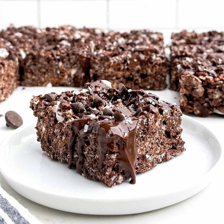 chocolate rice krispie bar on a white plate.