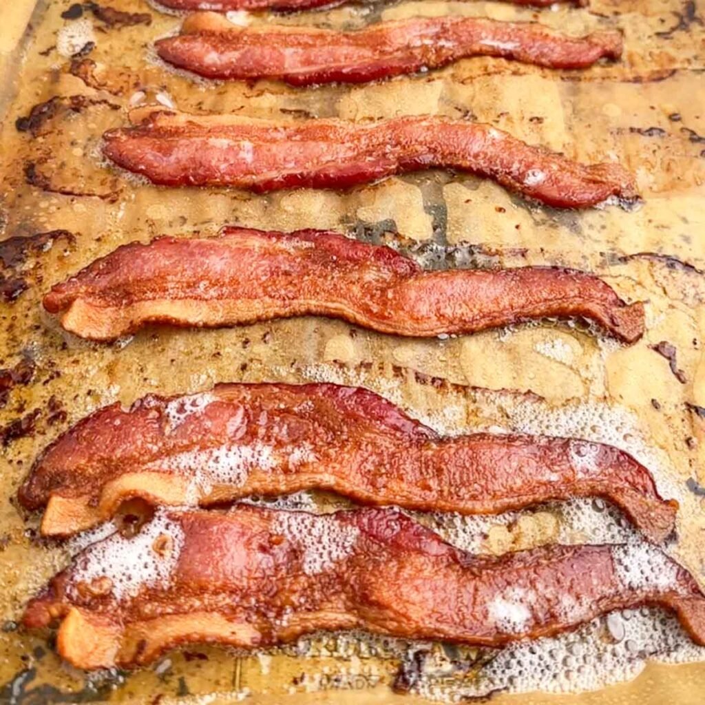 How to Cook Bacon in the Oven (with Parchment Paper) - Midwestern HomeLife
