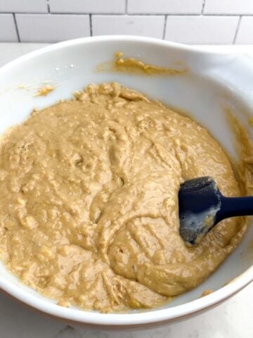 banana bar batter in a white mixing bowl.