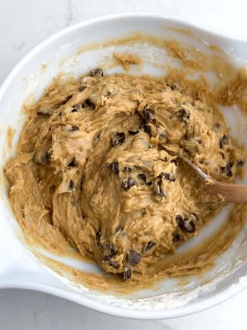banana blondie batter in a white mixing bowl.