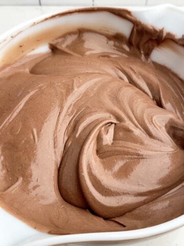 chocolate pudding filling in a white bowl.