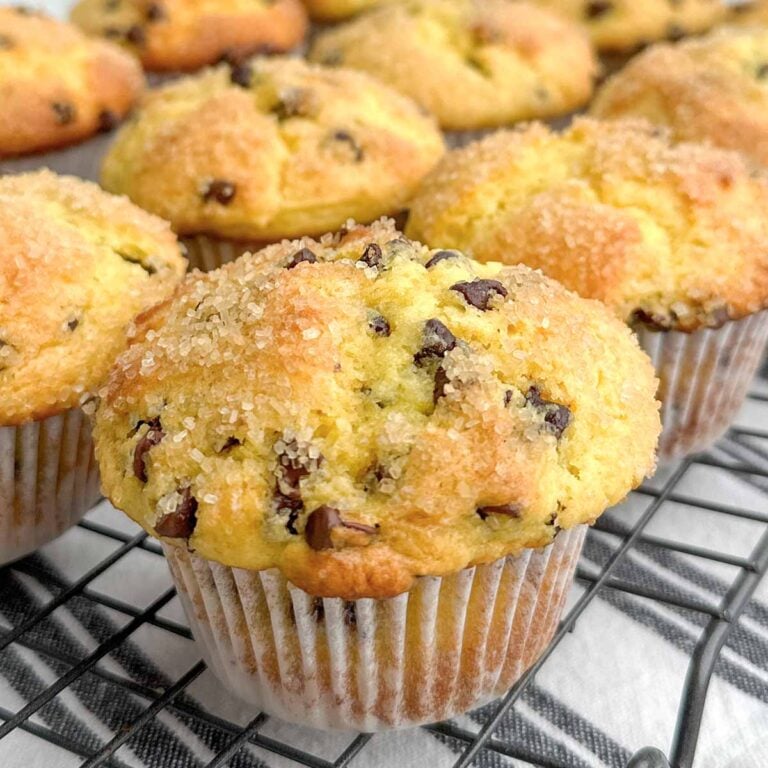 baked chocolate chip cake mix muffins on a wire rack.