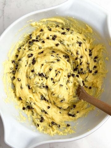 chocolate chip cake mix muffin batter in a white bowl.