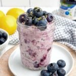 lemon blueberry overnight oats in a mason jar.