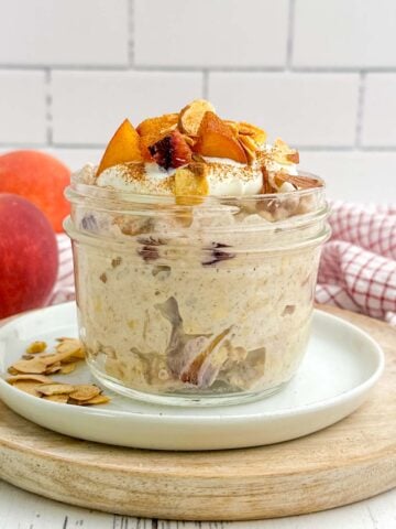 peach overnight oats in a mason jar.