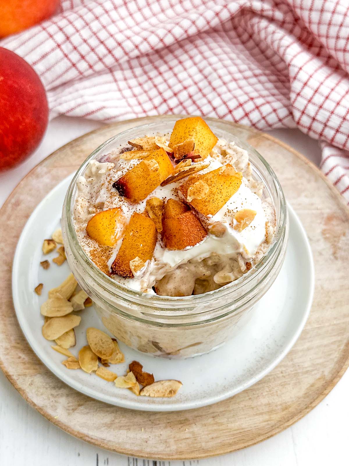 peach overnight oats in a mason jar.