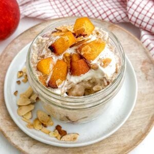 peach overnight oats in a mason jar.