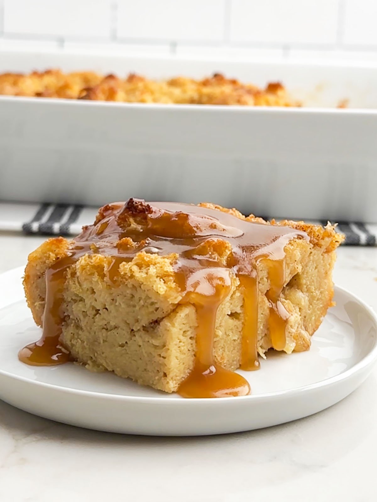 pineapple pudding topped with caramel whiskey sauce.