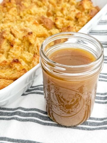 whiskey caramel sauce for bread pudding in a mason jar.